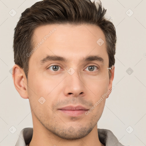 Neutral white young-adult male with short  brown hair and brown eyes