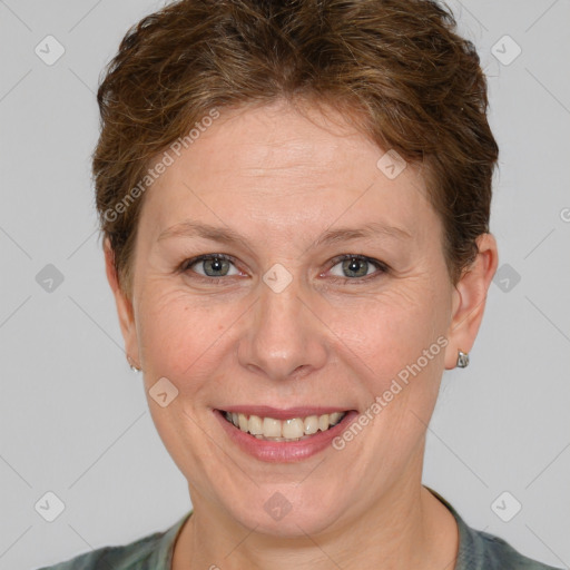 Joyful white adult female with short  brown hair and brown eyes