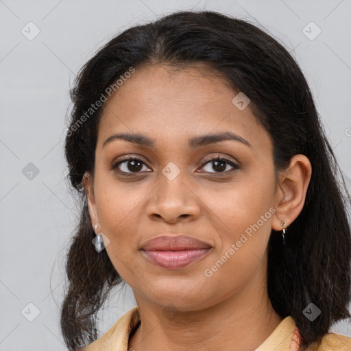 Joyful black young-adult female with medium  brown hair and brown eyes