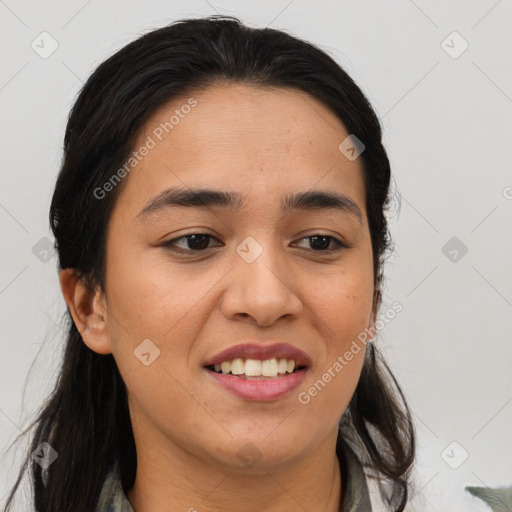 Joyful latino young-adult female with medium  brown hair and brown eyes