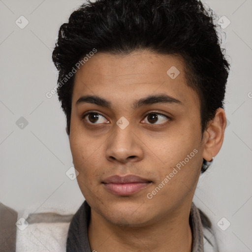 Neutral latino young-adult male with short  brown hair and brown eyes