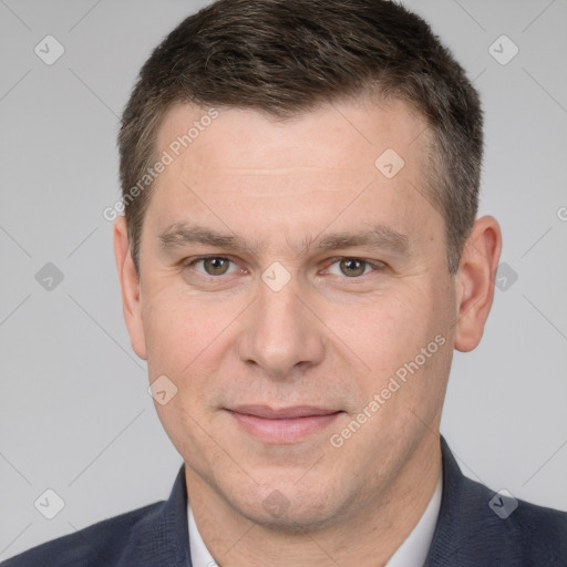 Joyful white adult male with short  brown hair and brown eyes