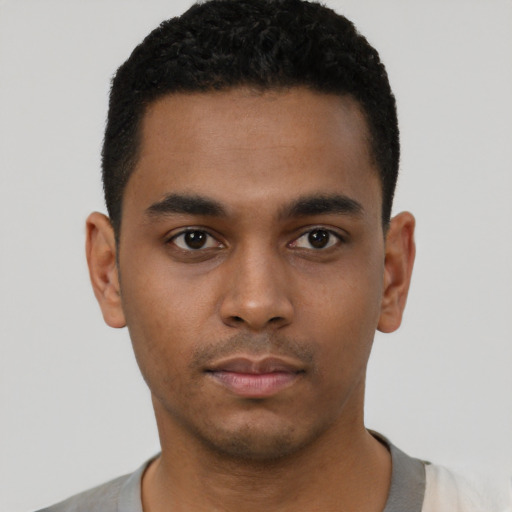 Neutral black young-adult male with short  black hair and brown eyes