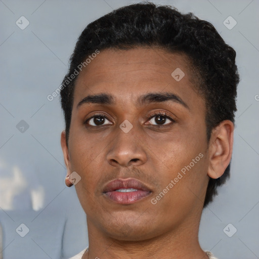 Neutral black young-adult female with short  brown hair and brown eyes