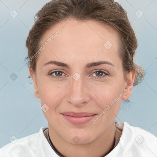 Joyful white adult female with short  brown hair and brown eyes