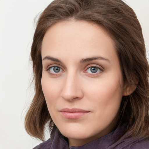 Neutral white young-adult female with long  brown hair and grey eyes