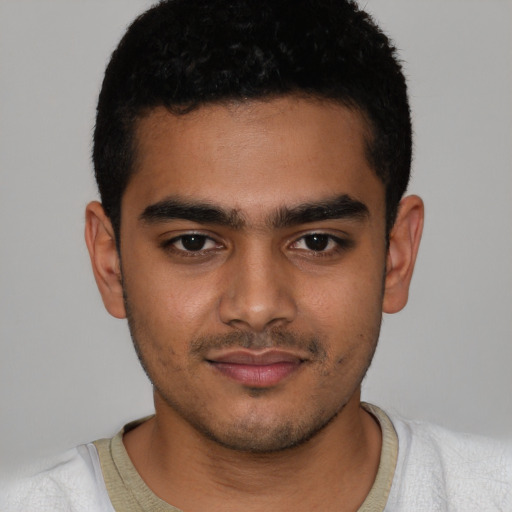 Neutral latino young-adult male with short  black hair and brown eyes