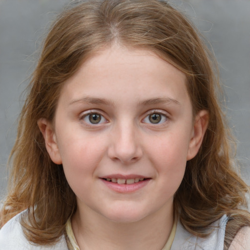 Joyful white child female with medium  brown hair and grey eyes