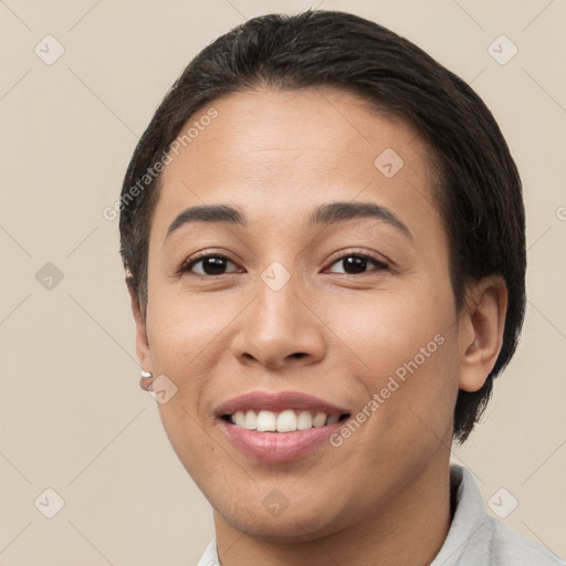 Joyful white young-adult female with short  brown hair and brown eyes