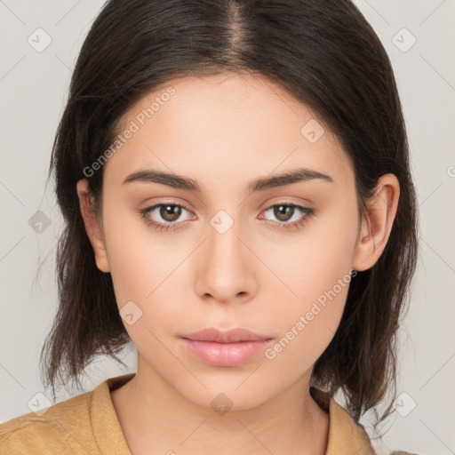 Neutral white young-adult female with medium  brown hair and brown eyes