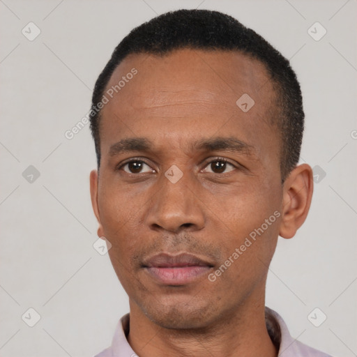 Neutral black adult male with short  black hair and brown eyes