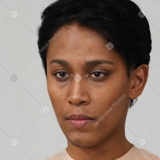 Neutral black young-adult female with short  black hair and brown eyes