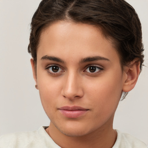 Neutral white young-adult female with short  brown hair and brown eyes