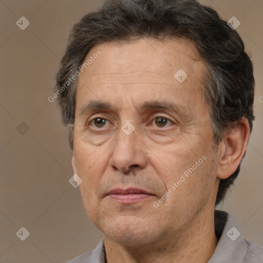 Joyful white middle-aged male with short  brown hair and brown eyes