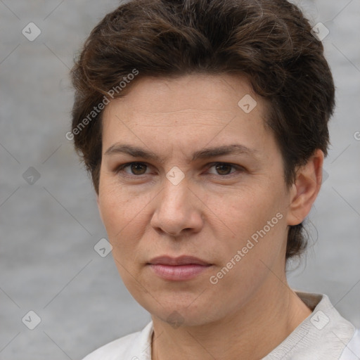 Joyful white adult female with short  brown hair and brown eyes