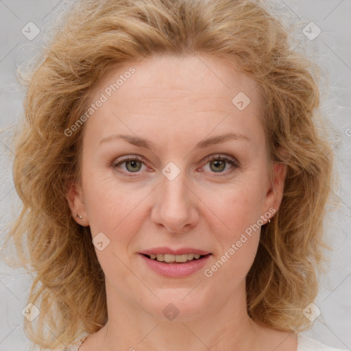 Joyful white young-adult female with medium  brown hair and blue eyes