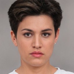 Neutral white young-adult female with short  brown hair and brown eyes