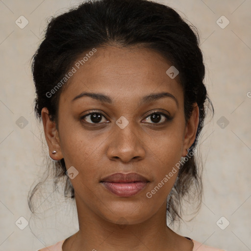 Joyful black young-adult female with medium  brown hair and brown eyes