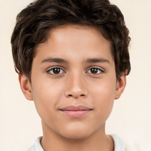 Joyful white child male with short  brown hair and brown eyes