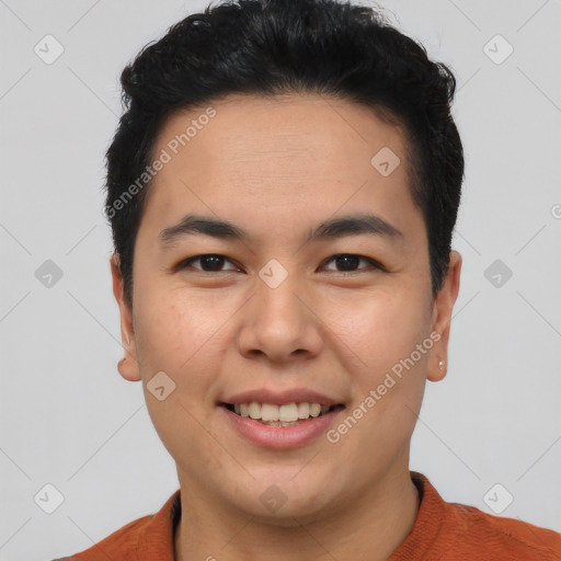 Joyful asian young-adult male with short  black hair and brown eyes