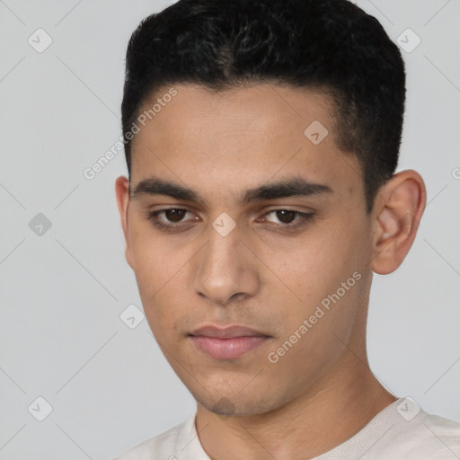 Neutral latino young-adult male with short  black hair and brown eyes