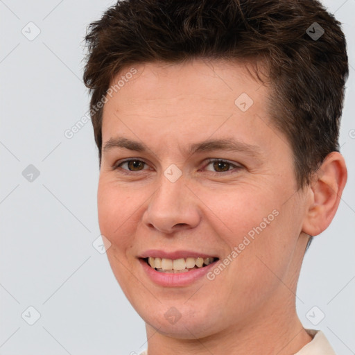 Joyful white young-adult female with short  brown hair and brown eyes