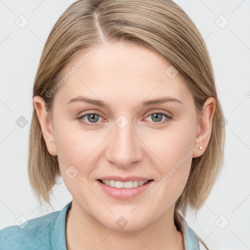 Joyful white young-adult female with medium  brown hair and blue eyes