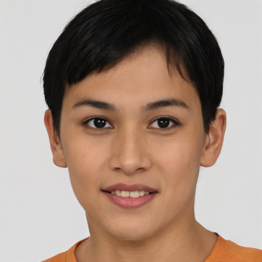 Joyful asian young-adult female with short  brown hair and brown eyes