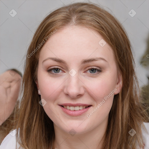 Joyful white young-adult female with medium  brown hair and blue eyes