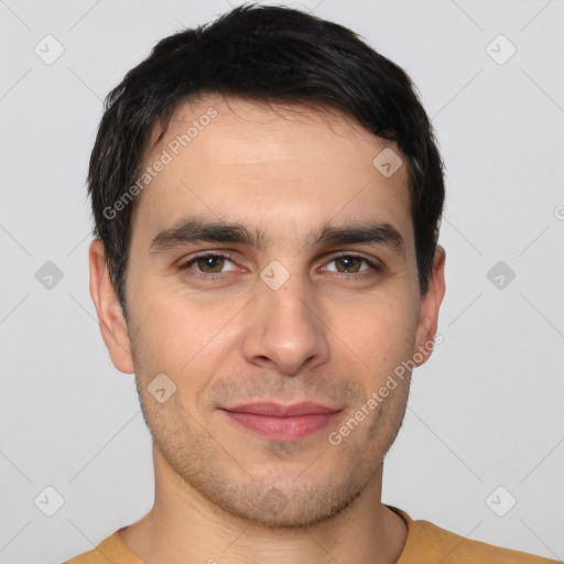 Joyful white young-adult male with short  brown hair and brown eyes