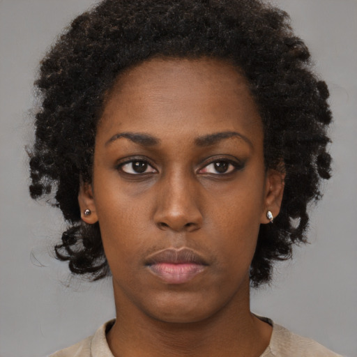 Neutral black young-adult female with short  black hair and brown eyes