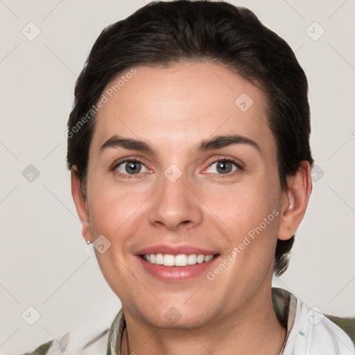 Joyful white young-adult female with short  brown hair and brown eyes