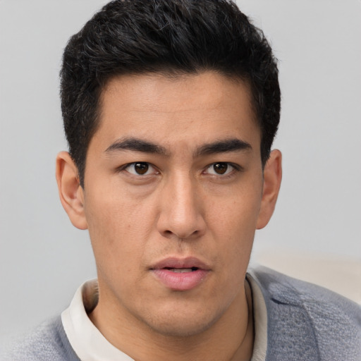 Neutral latino young-adult male with short  brown hair and brown eyes