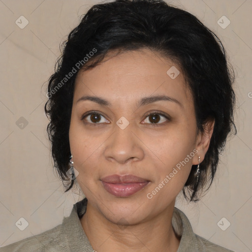 Joyful latino adult female with medium  brown hair and brown eyes