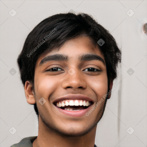 Joyful latino young-adult male with short  black hair and brown eyes