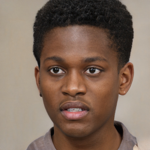 Neutral black young-adult male with short  brown hair and brown eyes