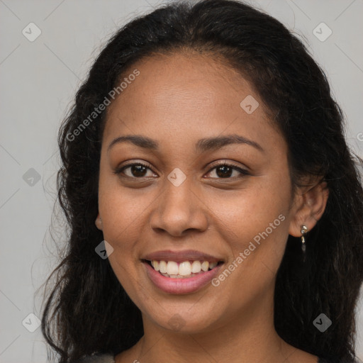 Joyful latino young-adult female with long  brown hair and brown eyes