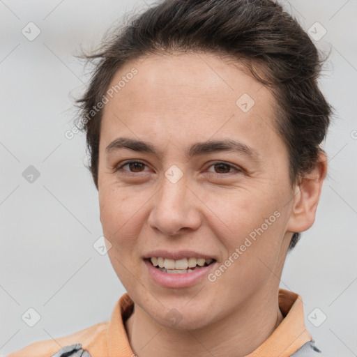 Joyful white young-adult female with short  brown hair and brown eyes