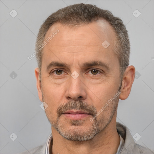 Neutral white adult male with short  brown hair and brown eyes