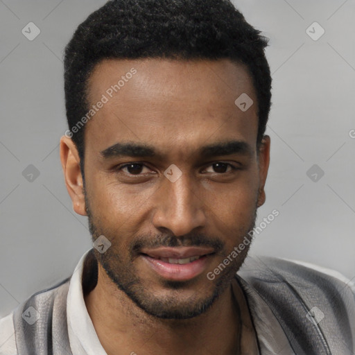 Joyful black young-adult male with short  black hair and brown eyes