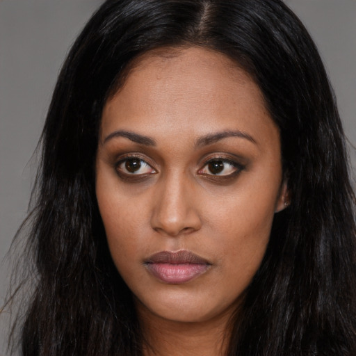 Neutral asian young-adult female with long  brown hair and brown eyes