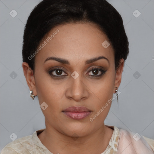 Joyful latino young-adult female with short  brown hair and brown eyes