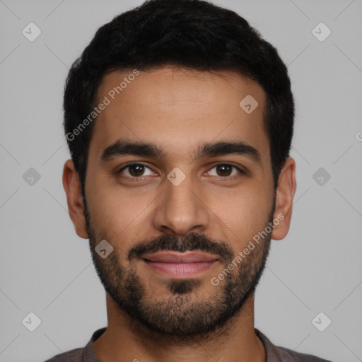 Joyful latino young-adult male with short  black hair and brown eyes