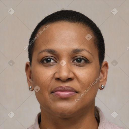 Joyful black young-adult female with short  brown hair and brown eyes