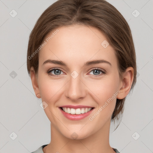 Joyful white young-adult female with medium  brown hair and green eyes