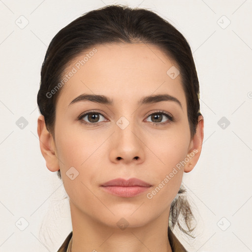 Neutral white young-adult female with long  brown hair and brown eyes