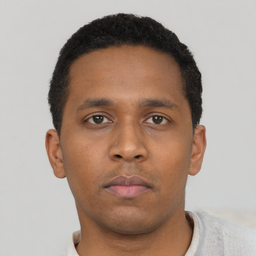 Neutral black young-adult male with short  brown hair and brown eyes