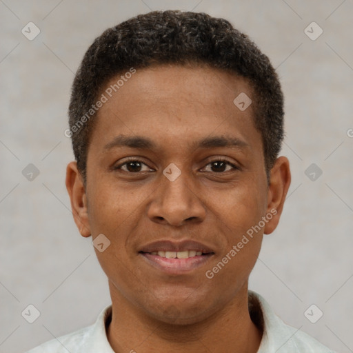 Joyful latino young-adult male with short  brown hair and brown eyes