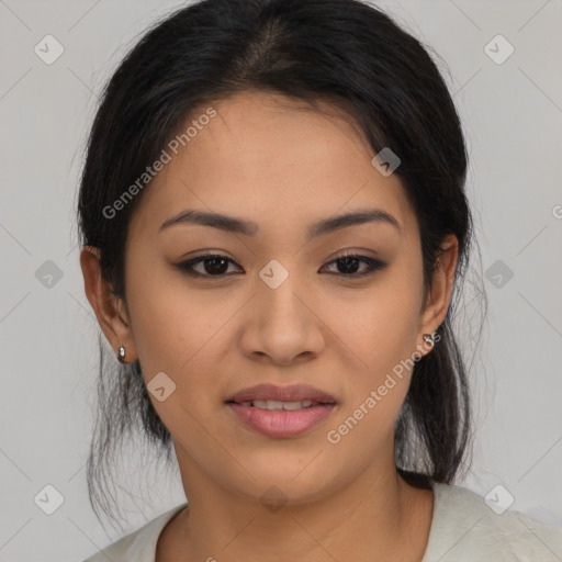 Joyful latino young-adult female with medium  brown hair and brown eyes