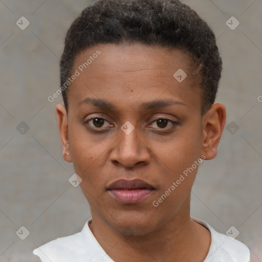 Joyful black young-adult male with short  brown hair and brown eyes